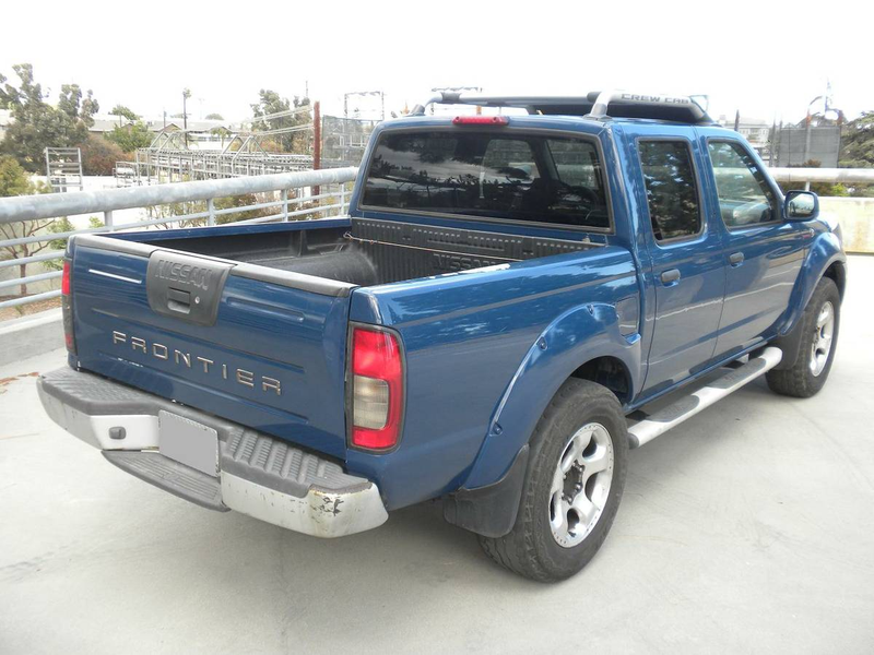 Illustration for article titled At $6,600, Might This 2001 Nissan S/C Crew Cab Pickup Be Your Final Frontier?